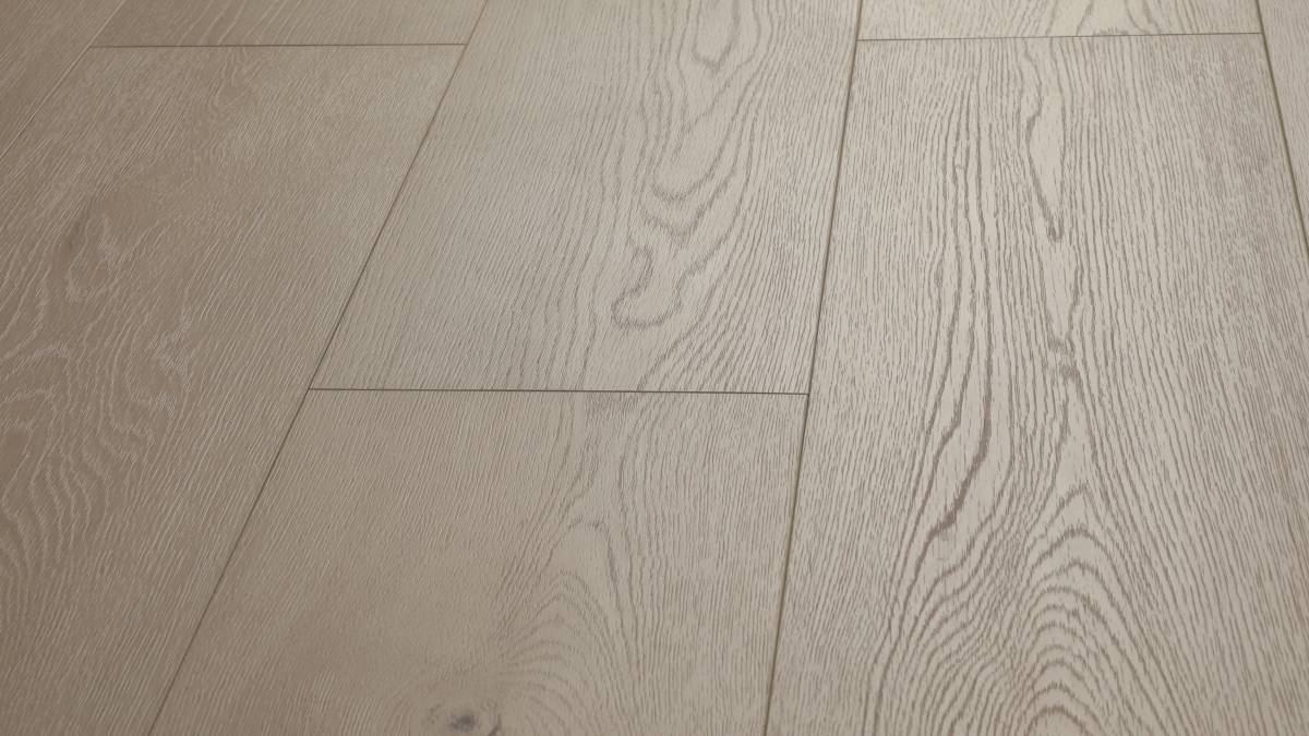 Lake Run AC5 laminate plank angle view showing 4-sided painted bevel and oak grain texture