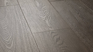 Aging Tree AC5 laminate plank angle view showing 4-sided painted bevel and embossed wood grain