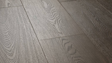 Aging Tree AC5 laminate plank angle view showing 4-sided painted bevel and embossed wood grain