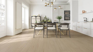 Beach Foam laminate flooring embossed-in-register light oak grain texture close-up - sand tones